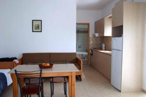 Kuchyň nebo kuchyňský kout v ubytování Evilion hotel