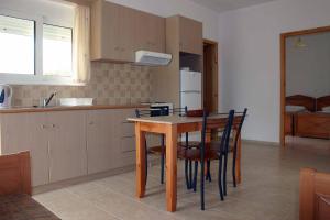 Kuchyň nebo kuchyňský kout v ubytování Evilion hotel