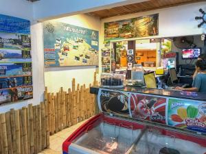 a room filled with various types of toys and items at Hostel Nirvana Taganga in Taganga