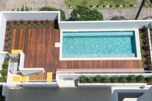a rendering of a swimming pool on top of a house at Pure Kirra in Gold Coast