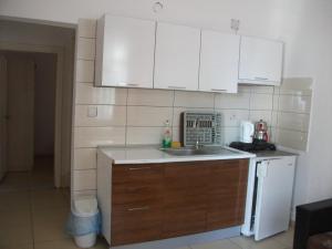 מטבח או מטבחון ב-Delphin Hotel Side