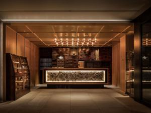a wine tasting room with a counter in the middle at Kyoto Granbell Hotel in Kyoto