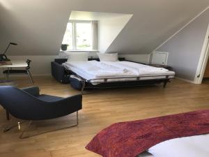 Voodi või voodid majutusasutuse Sixtus Sinatur Hotel & Konference toas