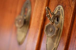 a close up of a door with a key chain at Bed & Breakfast Vila Baguc in Split