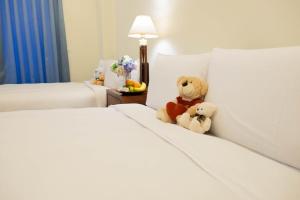 Krevet ili kreveti u jedinici u okviru objekta Na Na Ya Ji Bed and Breakfast