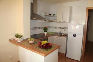 Kuchyň nebo kuchyňský kout v ubytování Apartamentos Casa Torres - Adults Only