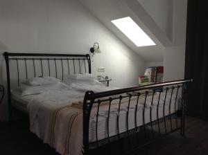 Кровать или кровати в номере Apartments Vila Oksana