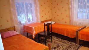 Postel nebo postele na pokoji v ubytování Kalamehe Farmstay
