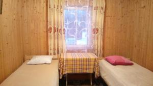 Postel nebo postele na pokoji v ubytování Kalamehe Farmstay