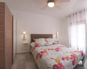 A bed or beds in a room at Casa Luz Cordoba