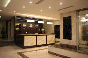 a lobby with a reception desk in a building at AlMuhaidb Residence Alkhafji in Al Khafji