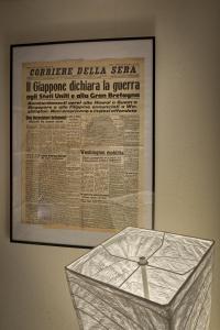 ボローニャにあるAppartamento Margheritaの壁紙傘