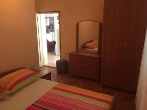 Postel nebo postele na pokoji v ubytování Apartments Ankica