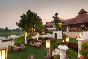 A garden outside RatiLanna Riverside Spa Resort