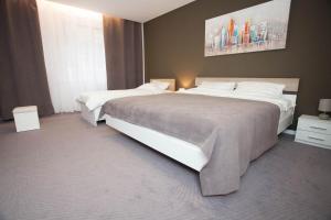 Una cama o camas en una habitación de Chess Apartments 5 fotos más