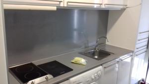 Kuchyň nebo kuchyňský kout v ubytování Apartamentos Turísticos Los Ángeles