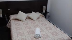 Postel nebo postele na pokoji v ubytování Apartamentos Turísticos Los Ángeles