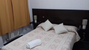 Postel nebo postele na pokoji v ubytování Apartamentos Turísticos Los Ángeles