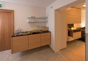 Kuchyň nebo kuchyňský kout v ubytování Hotel Garni Romantika