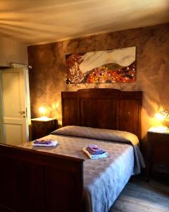 מיטה או מיטות בחדר ב-Il Borgo Antico