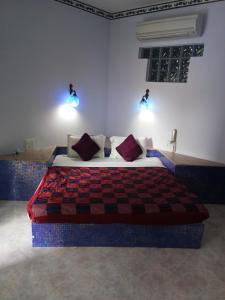 Letto o letti in una camera di Ray of Maya