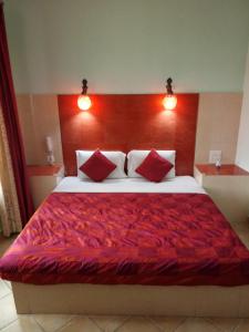 Letto o letti in una camera di Ray of Maya