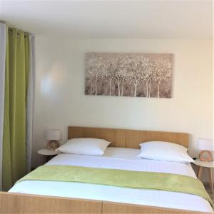 Postel nebo postele na pokoji v ubytování Apartments Marjan