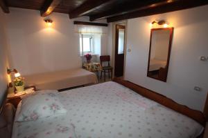 Postel nebo postele na pokoji v ubytování Accommodation Lily