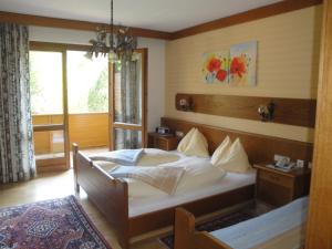 Postel nebo postele na pokoji v ubytování Pension & Appartement Steinwender