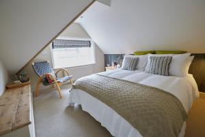 מיטה או מיטות בחדר ב-Lyndhurst House