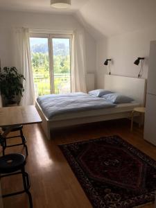 Postel nebo postele na pokoji v ubytování Guest House Vitaja