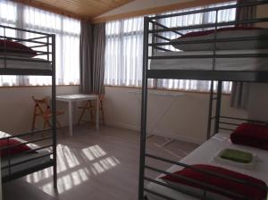Postel nebo postele na pokoji v ubytování O Cabalo Verde