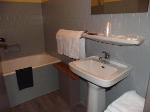 Koupelna v ubytování Hotel Valérie