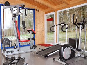 a gym with two treadmills and two tread machines at Hotel Klaus Störtebeker in Ralswiek