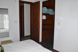 Een bed of bedden in een kamer bij Arenas del Mar