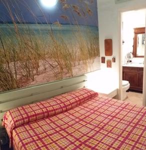 Posteľ alebo postele v izbe v ubytovaní Casa vacanze della Maddalena