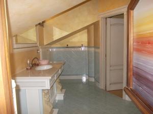 a bathroom with a sink and a shower at À La Maison De Gabry in Vibo Valentia Marina +90 photos
