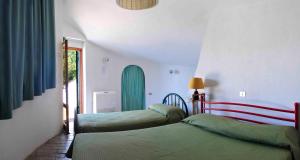 A bed or beds in a room at B&B Al Cavalluccio Marino