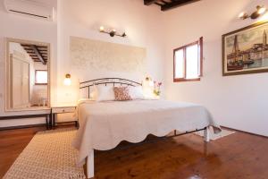 Llit o llits en una habitació de Guesthouse Casa Vittoria