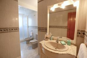 Koupelna v ubytování Villa hortencia