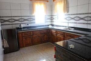 Kuchyň nebo kuchyňský kout v ubytování Grann Kaz Guest House
