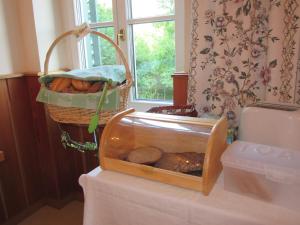 A bed or beds in a room at Waldpension Mück