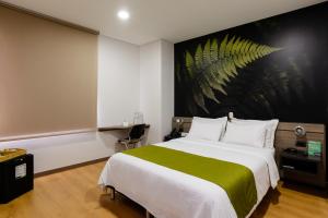 Postel nebo postele na pokoji v ubytování Hotel Vivre + 37 fotografií