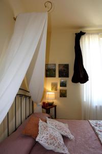 Letto o letti in una camera di LIGURIA home