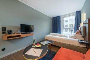 Telewizja i/lub zestaw kina domowego w obiekcie Hotel Ploberger