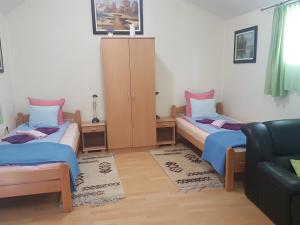 Postel nebo postele na pokoji v ubytování Guest House Rose