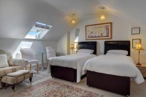Voodi või voodid majutusasutuse St. Aiden's Guesthouse toas