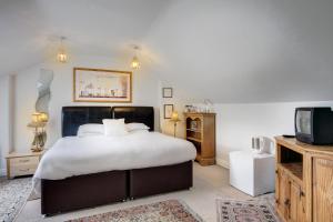 Voodi või voodid majutusasutuse St. Aiden's Guesthouse toas