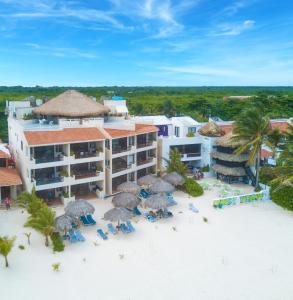 an aerial view of a resort on the beach at Aquatech Villas DeRosa Resort in Akumal