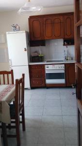 A kitchen or kitchenette at Aphrodite's House
